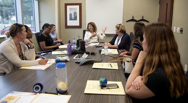 Tammy Tenace R.N., the Maternity Care Coordinator with the James A. Haley Veterans’ Hospital, Tampa, Fla., speaks to participants of the Women’s Health Transition Assistance Program (TAP), during a tour of the hospital’s Women’s Center in Tampa, Fla., Jul 6th Air Mobility Wing Public Affairs