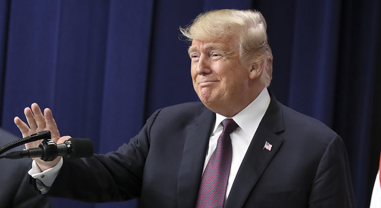 President Donald Trump waves after he delivered remarks on a supporting veterans and military families event on November 15, 2018 in Washington, DC.