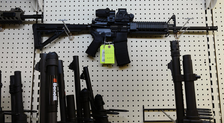 On display at a gun shop in Wendell, N.C., an AR-15 assault rifle manufactured by Core15 Rifle Systems in December 18, 2012. ar-15