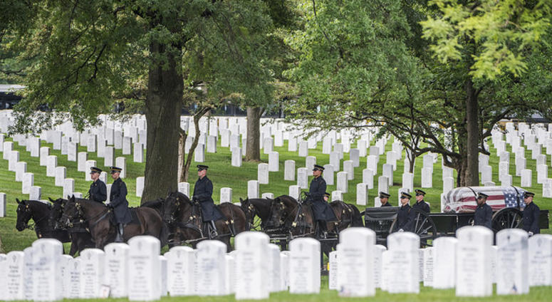 The 3d U.S. Infantry Regiment (The Old Guard) Caisson Platoon helps conduct a Full Honors Group Funeral Service for U.S. Army Air Forces Airmen missing from World War II in Section 60 of Arlington National Cemetery, Arlington, Virginia, June 27, 2018.
