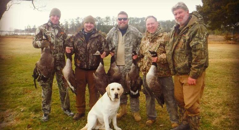Ben Kiernan, Rob Jones, Eric Dehm and Phil Briggs pose after a successful hunt