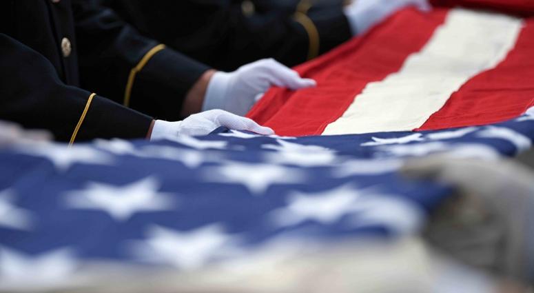 American flag, white glove