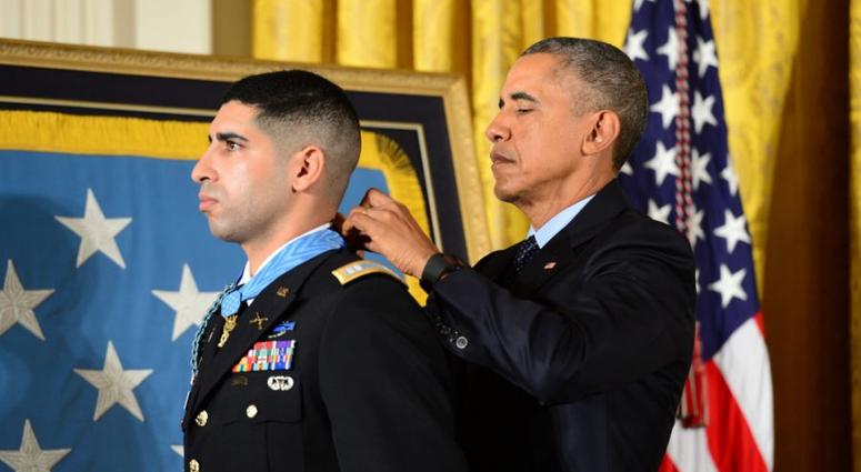 President Barack Obama presents the Medal of Honor to retired U.S. Army Capt. Florent Groberg during a ceremony at the White House in Washington, Nov. 12, 2015
