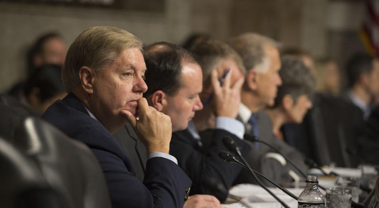Senator Lindsey Graham of South Carolina listens as Secretary of Defense Ash Carter and Marine Corps Gen. Joseph F. Dunford Jr., chairman of the Joint Chiefs of Staff, testify before the Senate Armed Services Committee on Middle East strategy.