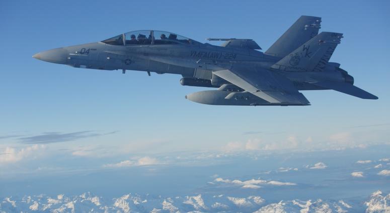 An F/A-18D Hornet, with Marine All-Weather Fighter Attack Squadron (VMFA) 224, conducts an aerial refuel in Norway, during Exercise Trident Juncture 18, Oct. 24, 2018.