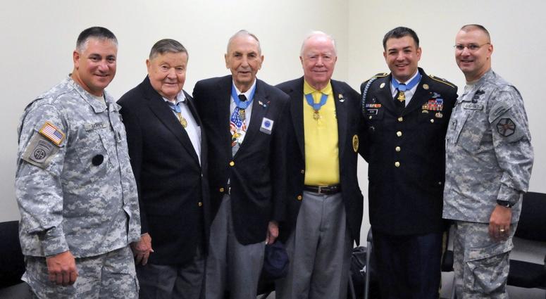 (From left to right) Sgt. Maj. Matthew D. Barnes, CMH Col. Joe M. Jackson, CMH Pvt. Wilburn K. Ross, CMH Maj. Bruce P. Crandall, CMH Sgt. 1st Class Leroy A. Petry, and Joint Base Garrison Commander Col. Thomas H. Brittain on Aug. 19, 2011.
