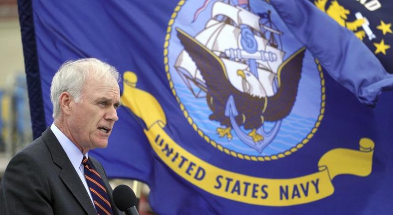 FILE - In this July 12, 2018 file photo, Navy Secretary Richard Spencer delivers a speech during a re-dedication ceremony for the USS John S. McCain at the U.S. Naval base in Yokosuka, southwest of Tokyo. Thousands of Navy and Marine Corps veterans of Ira