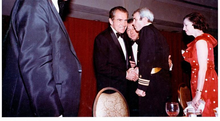 President Richard Nixon and U.S. Navy Lieutenant Commander John McCain at the 1973 White House Correspondents Dinner, March 3, 1973.