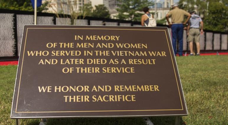 Retired U.S. Marine Corps Sgt. Maj. John Canley visits the Traveling Vietnam Memorial Wall during Marine Week Charlotte, N.C., Sept. 8, 2018.