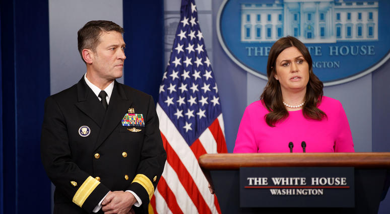 White House press secretary Sarah Huckabee Sanders introduces Admiral Ronny Jackson before addressing regarding President Donald Trump's health from a recent exam during the White House press briefing at the White House in Washington D.C.