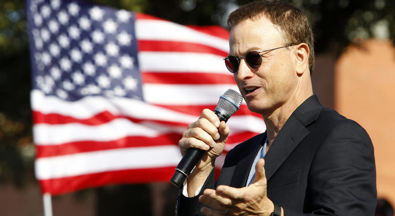 Actor Gary Sinise speaks to the crowd at the Snowball Express event in the Stockyards Sunday, December 2, 2012, in Fort Worth, Texas