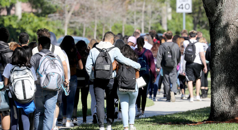 Marjory Stoneman Douglas High School students join the walkout protest in honor of the 17 victims killed at the school on Valentine's Day on March 14, 2018 in Parkland, Fla.