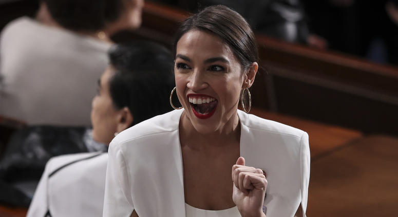 Rep. Alexandria Ocasio-Cortez, D-N.Y., reacts during President Donald Trump's State of the Union address to a joint session of Congress in the chamber of the U.S. House of Representatives on February 5, 2019 in Washington, DC.