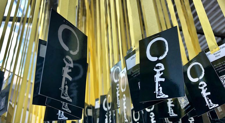 Yellow ribbons for each of the 6,964 service members killed since 9/11 hang in the Women In Military Service For America Memorial in Arlington National Cemetery as part of Mindful Memorial Day. MindfulMemorialDay2
