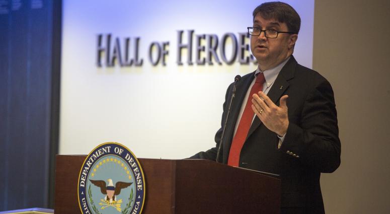 Robert Wilkie, Under Secretary of Defense for Personnel and Readiness, speaks to a gathering of service members from each military branch about the importance of family readiness at the 2017 Department of Defense Family Readiness Award.