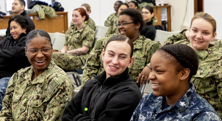 YOKOSUKA, Japan (March 13, 2018) Attendees react to a presentation during a Women’s History Month symposium in Yokosuka. The attendees were taking part in Women Trailblazing at Sea -- a symposium featuring female leader presentations, discussion groups an WomenVeteransSymposium