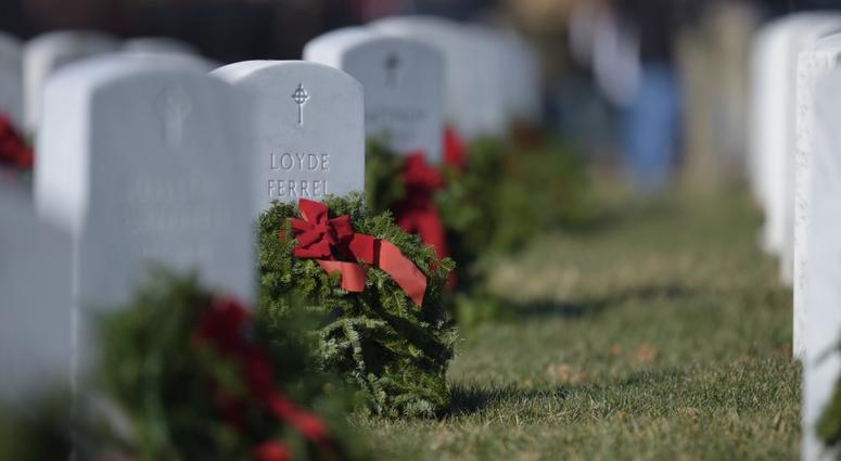 Wreaths lay on head stones at Arlington National Cemetery, Virginia.