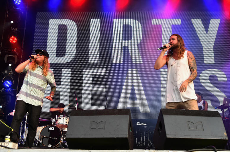 Dustin Bushnell (L) and Jared Watson of Dirty Heads perform onstage during day 3 of the Firefly Music Festival on June 20, 2015 in Dover, Delaware. Dustin Bushnell (L) and Jared Watson of Dirty Heads perform onstage during day 3 of the Firefly Music Festival on June 20, 2015 in Dover, Delaware.
