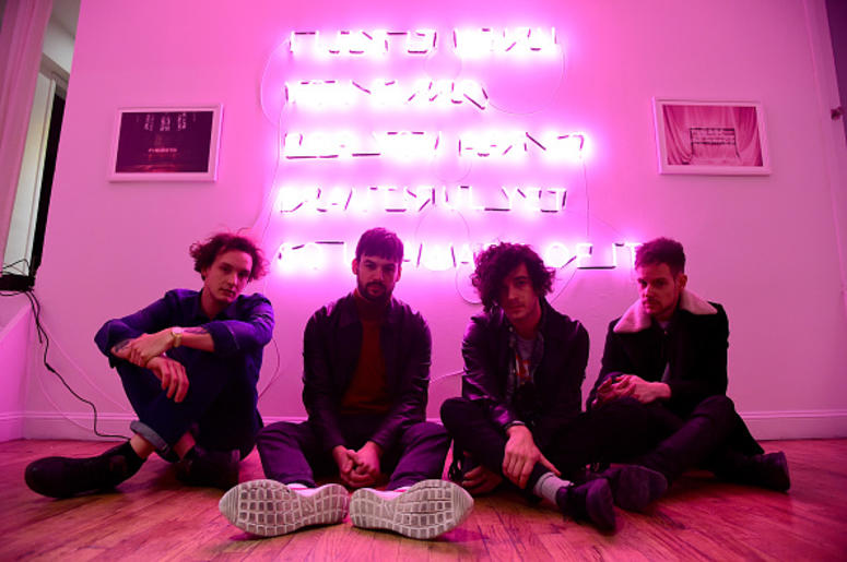George Daniel, Ross MacDonald, Matthew Healy and Adam Hann of The 1975 appear during the The 1975 album release pop-up for "I Like It When You Sleep, For You Are So Beautiful Yet So Unaware Of It" on February 25, 2016 in New York City. (Photo by Theo Warg