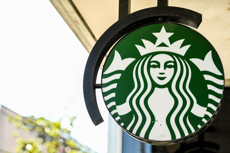 Apr 17, 2018; Houston, TX, USA; View of a sign with the company logo at Starbucks. Mandatory Credit: Shanna Lockwood-USA TODAY Sports News: Starbucks