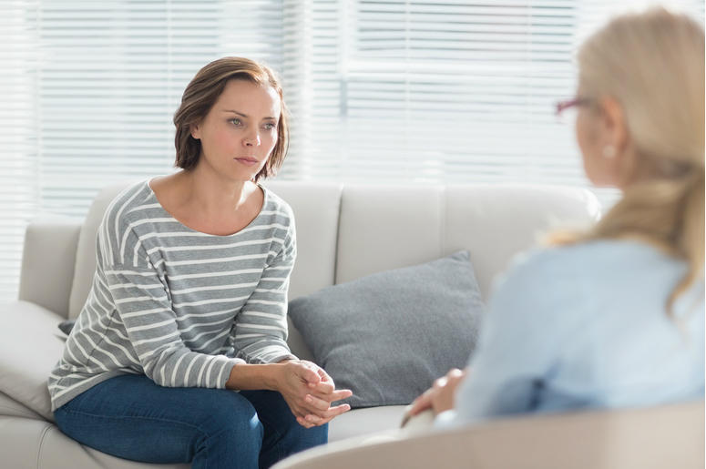 Woman talking to her therapist Woman talking to her therapist