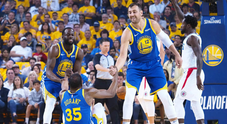 Andrew Bogut with Kevin Durant and Draymond Green Andrew Bogut with Kevin Durant and Draymond Green