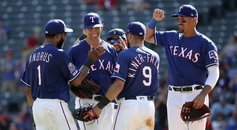 Arlington, TX, USA; Texas Rangers starting pitcher Mike Minor (23) celebrates with teammates during the ninth inning against the Boston Red Sox at Globe Life Park in Arlington. Arlington, TX, USA; Texas Rangers starting pitcher Mike Minor (23) celebrates with teammates during the ninth inning against the Boston Red Sox at Globe Life Park in Arlington.