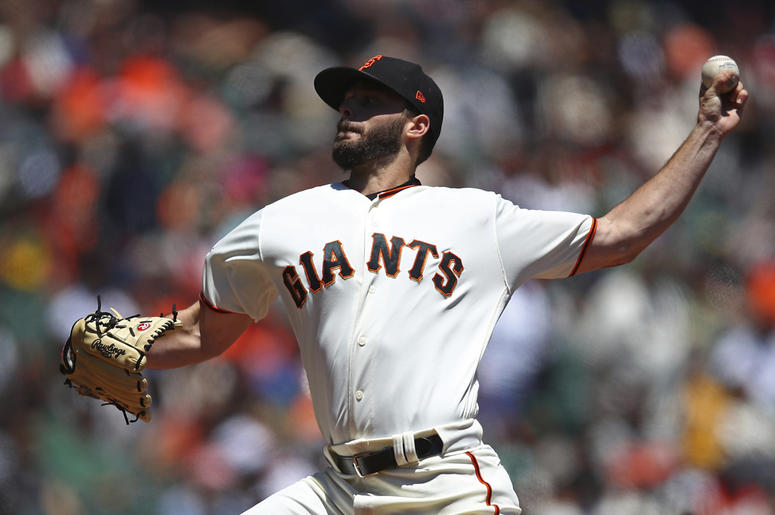 AP18196739440937 San Francisco Giants pitcher Andrew Suarez works against the Oakland Athletics in the first inning of a baseball game Sunday, July 15, 2018, in San Francisco. (AP Photo/Ben Margot)