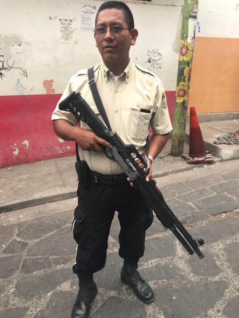 An armed soldier patrols the streets in Panchimalco, El Salvador An armed soldier patrols the streets in Panchimalco, El Salvador