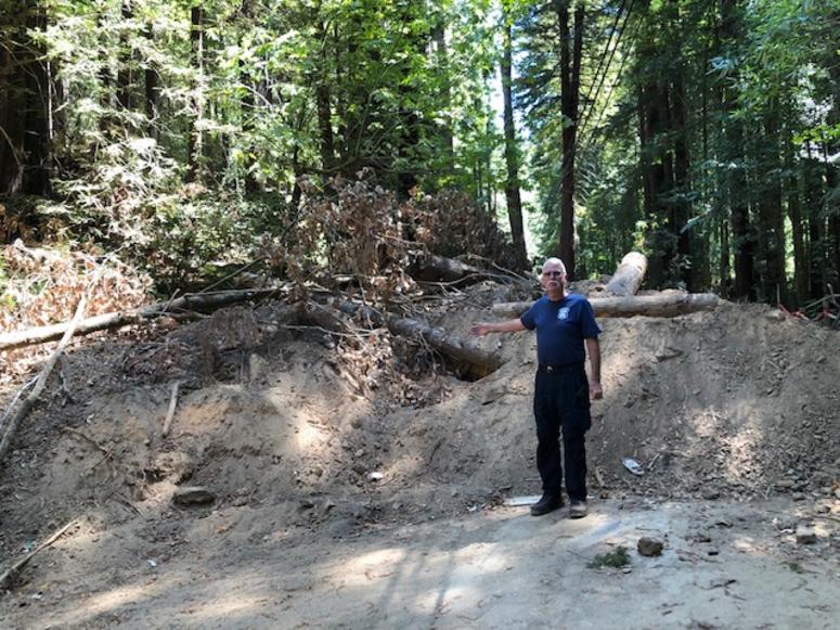 Monte Rio Fire Chief Steve Baxman points out major debris flow left sitting for months Monte Rio Fire Chief Steve Baxman points out major debris flow left sitting for months