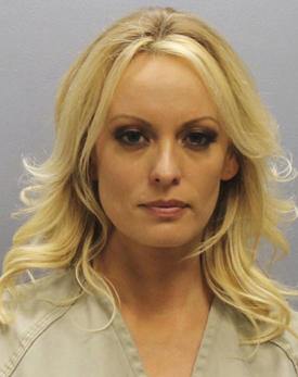AP18193421421867 This photo provided by the Franklin County Sheriff's Office on Thursday, July 12, 2018, shows porn actress Stormy Daniels. Daniels was arrested at a Columbus, Ohio strip club and is accused of letting patrons touch her in violation of a state law, her att