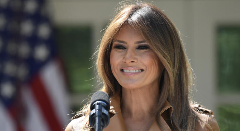 AP18134697750433 In this May 7, 2018 photo, First lady Melania Trump speaks on her initiatives during an event in the Rose Garden of the White House in Washington. The White House says Melania Trump is hospitalized after undergoing a procedure to treat a benign kidney con