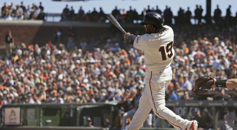 AP18179815035747 San Francisco Giants' Alen Hanson follows through on a two-run double to shallow right field off Colorado Rockies relief pitcher Adam Ottavino in the eighth inning of a baseball game Thursday, June 28, 2018, in San Francisco. (AP Photo/Eric Risberg)