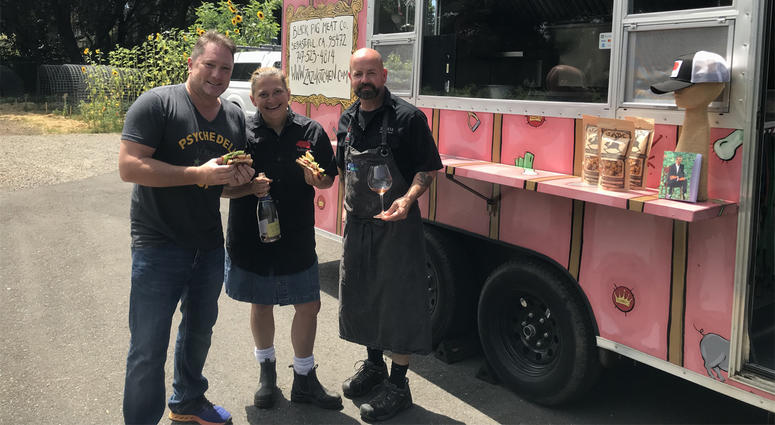 Liam with Chefs John Stewart & Duskie Estes of "The Black Piglet" food truck Liam with Chefs John Stewart & Duskie Estes of "The Black Piglet" food truck