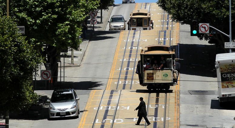 Cable cars travel along Powell Street on June 9, 2011 in San Francisco, California. Cable cars travel along Powell Street on June 9, 2011 in San Francisco, California.
