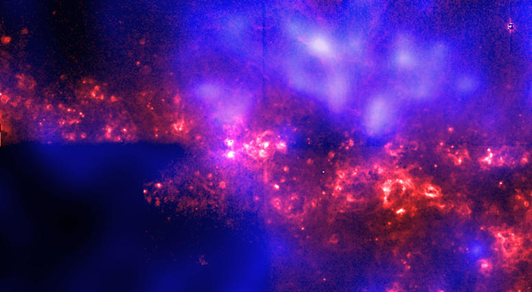 An image of NASA''s Chandra X-ray Observatory and Hubble Space Telescope shows a halo of hot gas surrounding spiral galaxy NGC 4631 that is similar to the Milky Way galaxy, June 19, 2001. An image of NASA''s Chandra X-ray Observatory and Hubble Space Telescope shows a halo of hot gas surrounding spiral galaxy NGC 4631 that is similar to the Milky Way galaxy, June 19, 2001.