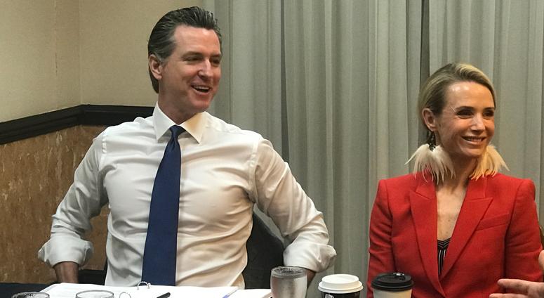 Governor Newsom and his wife at a roundtable meeting on their last day in El Salvador