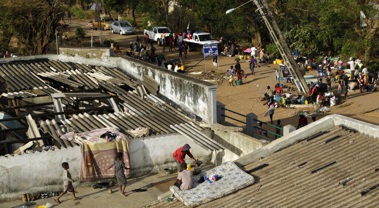 Displaced families set up their bedding on top of the roof in Buzi district, 200 kilometers (120 miles) outside Beira, Mozambique Displaced families set up their bedding on top of the roof in Buzi district, 200 kilometers (120 miles) outside Beira, Mozambique