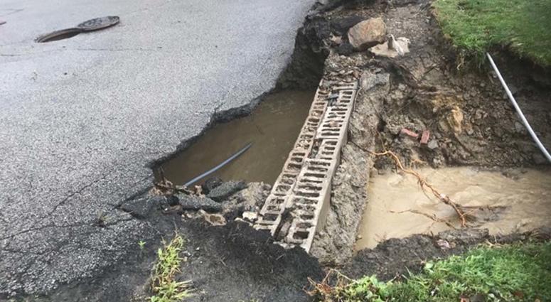 Heavy Rains Cause Sinkhole To Open Along McKnight Road Heavy Rains Cause Sinkhole To Open Along McKnight Road