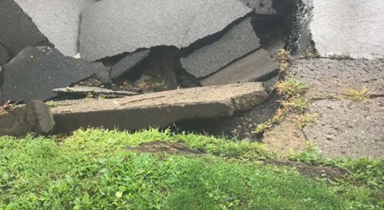 Heavy Rains Cause Sinkhole To Open Along McKnight Road Heavy Rains Cause Sinkhole To Open Along McKnight Road