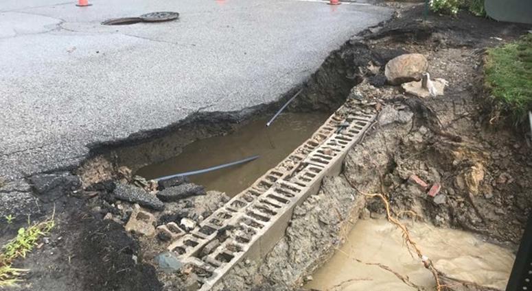 Heavy Rains Cause Sinkhole To Open Along McKnight Road Heavy Rains Cause Sinkhole To Open Along McKnight Road