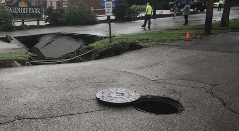 Heavy Rains Cause Sinkhole To Open Along McKnight Road Heavy Rains Cause Sinkhole To Open Along McKnight Road