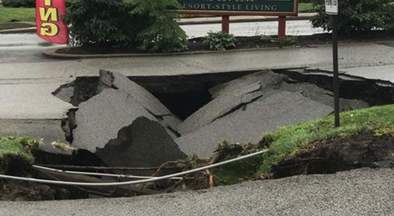 Heavy Rains Cause Sinkhole To Open Along McKnight Road Heavy Rains Cause Sinkhole To Open Along McKnight Road