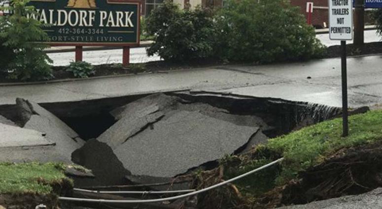 Heavy Rains Cause Sinkhole To Open Along McKnight Road Heavy Rains Cause Sinkhole To Open Along McKnight Road