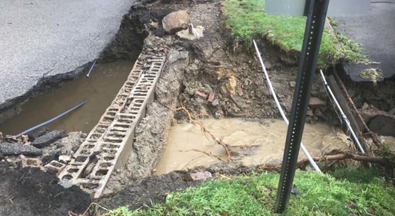 Heavy Rains Cause Sinkhole To Open Along McKnight Road Heavy Rains Cause Sinkhole To Open Along McKnight Road