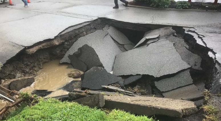 Heavy Rains Cause Sinkhole To Open Along McKnight Road Heavy Rains Cause Sinkhole To Open Along McKnight Road