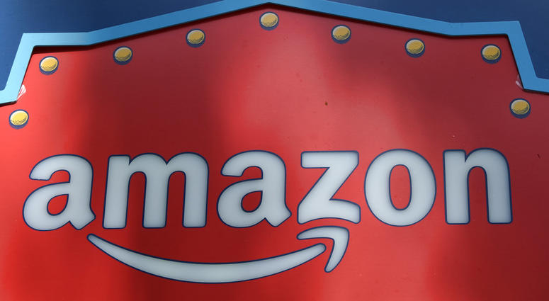 This Oct. 23, 2018, file photo shows an Amazon logo atop the Amazon Treasure Truck The Park DTLA office complex in downtown Los Angeles DO NOT USE