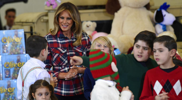First lady Melania Trump speaks with children during a Toys for Tots event at Joint Base Anacostia-Bolling in Washington, Tuesday, Dec. 11, 2018. DO NOT USE