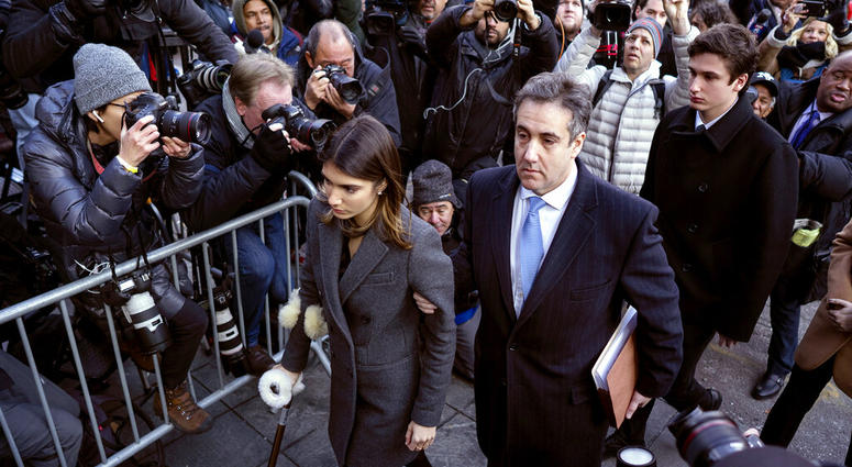 Michael Cohen, center, President Donald Trump's former lawyer, accompanied by his children Samantha, left, and Jake, right, arrives at federal court for his sentencing in New York. Michael Cohen, center, President Donald Trump's former lawyer, accompanied by his children Samantha, left, and Jake, right, arrives at federal court for his sentencing in New York.