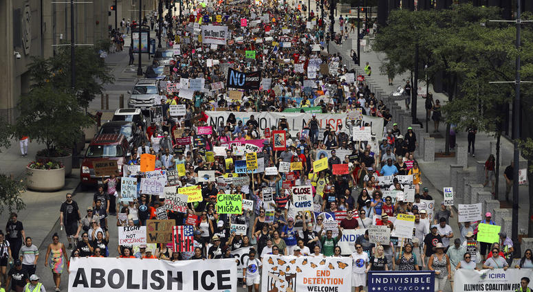 Thousands of people, including immigrants and their supporters, rally against President Trump's immigration policies as they march from Daley Plaza to the Chicago field office of Immigration and Customs Enforcement, Saturday, July 13, 2019, in Chicago. Thousands of people, including immigrants and their supporters, rally against President Trump's immigration policies as they march from Daley Plaza to the Chicago field office of Immigration and Customs Enforcement, Saturday, July 13, 2019, in Chicago.